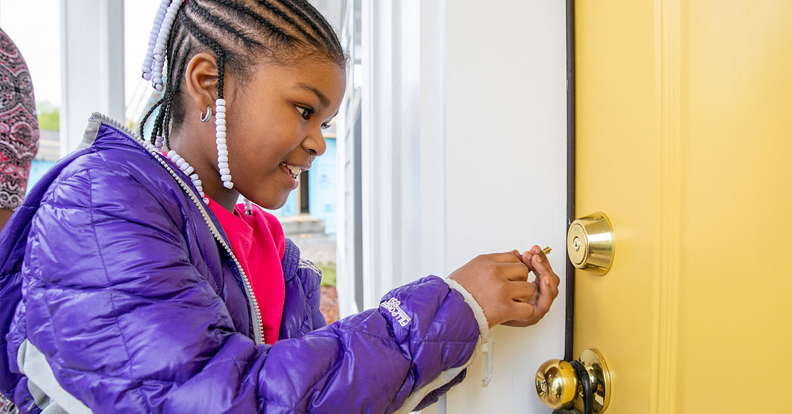 Girl opening door